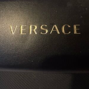 Versace Black and Gold Leather Piece